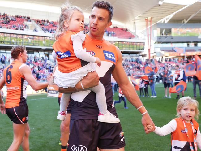 SYDNEY, AUSTRALIA - SEPTEMBER 07: Brett Deledio of the Giants walks through the race with his children during the AFL 2nd Elimination Final match between the Greater Western Sydney Giants and the Western Bulldogs at GIANTS Stadium on September 07, 2019 in Sydney, Australia. (Photo by Matt King/AFL Photos/via Getty Images)