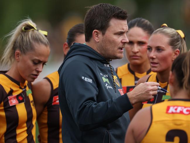 MELBOURNE, AUSTRALIA - SEPTEMBER 21: Daniel Webster, Senior Coach of the Hawks speaks to the team during the round four AFLW match between St Kilda Saints and Hawthorn Hawks at RSEA Park, on September 21, 2024, in Melbourne, Australia. (Photo by Daniel Pockett/AFL Photos/via Getty Images)