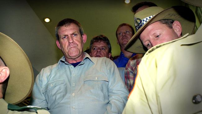 Bradley John Murdoch arrives under police escort at Darwin Airport to face murder charges. Picture: Patrina Malone