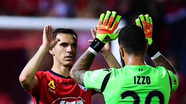 Advertiser Golden Boots winner Isaias celebrates with Paul Izzo. Picture: Mark Brake/Getty Images