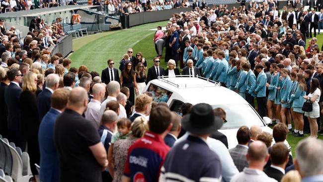 GEELONG, AUSTRALIA - FEBRUARY 14: The Selwood family are seen as the hearse leaves the arena during Troy Selwood's Funeral Service at GMHBA Stadium on February 14, 2025 in Geelong, Australia. (Photo by Michael Willson/AFL Photos via Getty Images)