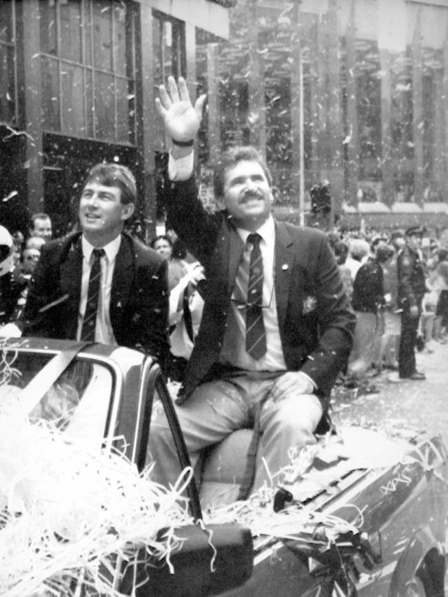 Allan Border (R) and Geoff Marsh during the tickertape parade through the streets of Sydney to celebrate Australia's team return home after winning back the Ashes.