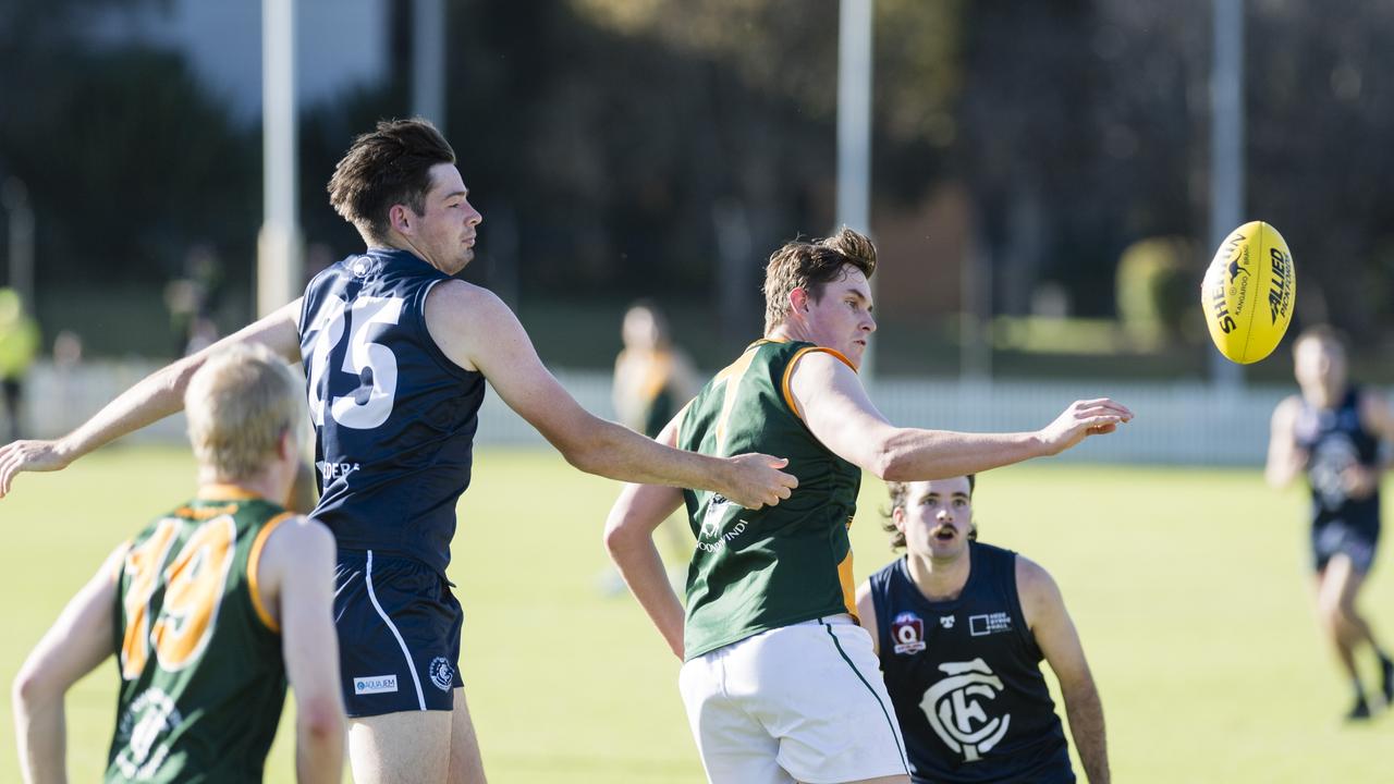 David Oakley (left) of Coolaroo against William Rogers of Goondiwindi Hawks in AFL Darling Downs Allied Cup senior men grand final at Rockville Park, Saturday, September 2, 2023. Picture: Kevin Farmer