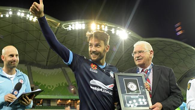 Milos Ninkovic of Sydney FC wins the Most Valuable Player award on Friday night.