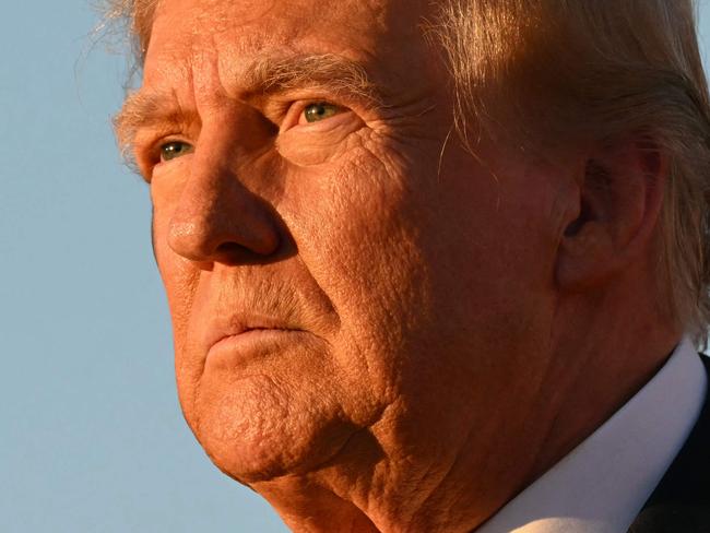 TOPSHOT - Former US President and Republican presidential candidate Donald Trump speaks during a campaign rally at site of his first assassination attempt in Butler, Pennsylvania on October 5, 2024. (Photo by Jim WATSON / AFP)