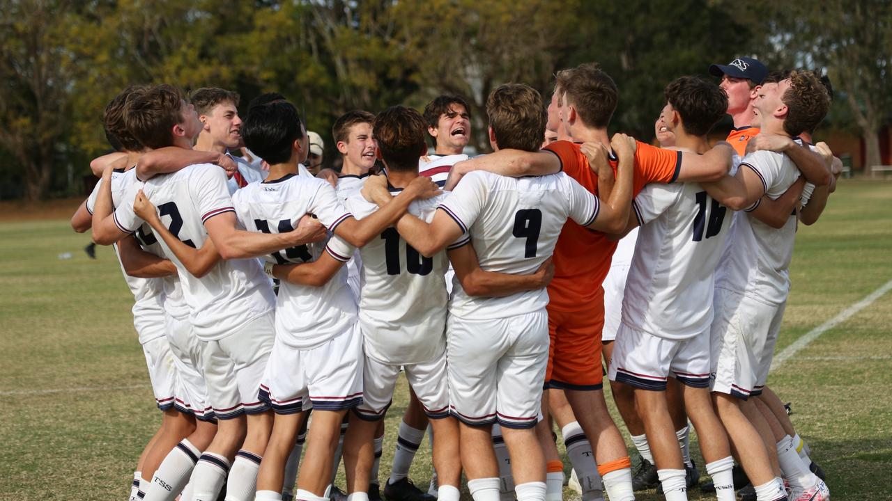 The Southport School celebrates after its 2020 GPS First XI football premiership win against St Joseph's Gregory Terrace. Picture: TSS