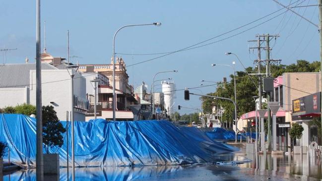 Water outside the temporary levee wall in Maryborough.