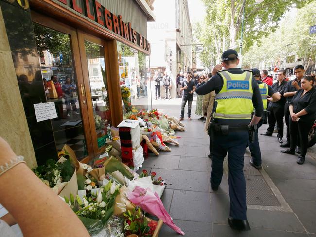 MELBOURNE, AUSTRALIA - NOVEMBER 10:  Mourners lay floral tributes at the iconic Melbourne cafe Pellegrinis on November 10, 2018 in Melbourne, Australia. Co-owner of the cafe Sisto Malaspina died from injuries suffered in an incident on Bourke Street on November 9th. A man was shot dead by police after he set his car alight in Bourke St mall and went on a stabbing frenzy on Friday afternoon. One person was killed and another two injured. Police are treating the event as a terrorist attack.  (Photo by Darrian Traynor/Getty Images)