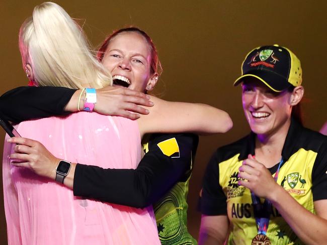 Meg Lanning hugs pop star Katy Perry after their win. Picture: Cameron Spencer/Getty Images.