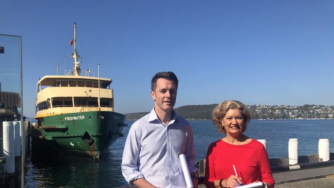 Shadow Transport Minister Chris Minns and Cr Candy Bingham, in front of one of Manly's iconic Freshwater class ferries. Picture: Julie Cross