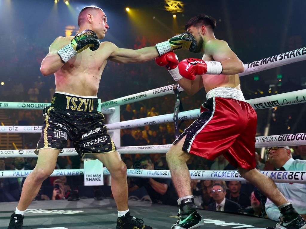 Tim Tszyu (left) punches Carlos Ocampo during the WBO Iterim Super-Welterwight title bout at Gold Coast Convention and Entertainment Centre. Picture: Chris Hyde/Getty Images.