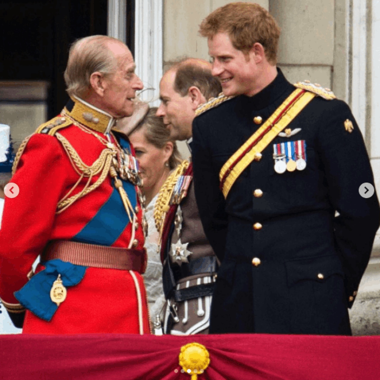 Prince Philip and Prince Harry sharing a moment in 2014.