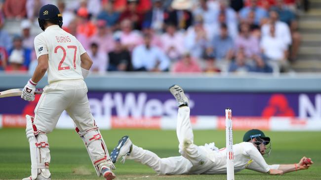 England batsman Rory Burns looks on as Cameron Bancroft dives to catch him out during day two. Picture: Getty Images