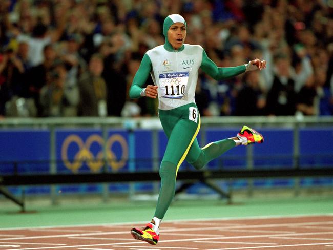 Australia’s Cathy Freeman crosses the line to win gold in the Women’s 400m Final during the Sydney 2000 Olympic Games. Picture: Mike Powell/Allsport