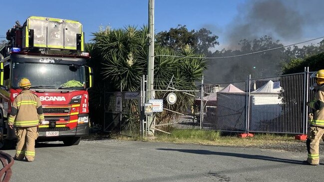 Fire broke out at a Yatala storage facility on Monday afternoon. Pic: QAS