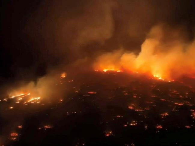 An aerial view of a wildfire in Kihei, Maui County, Hawaii, U.S., August 8, 2023 in this screen grab obtained from a social media video.   Clint Hansen of Maui Real Estate Radio/TMX via REUTERS  THIS IMAGE HAS BEEN SUPPLIED BY A THIRD PARTY. MANDATORY CREDIT. NO RESALES. NO ARCHIVES.