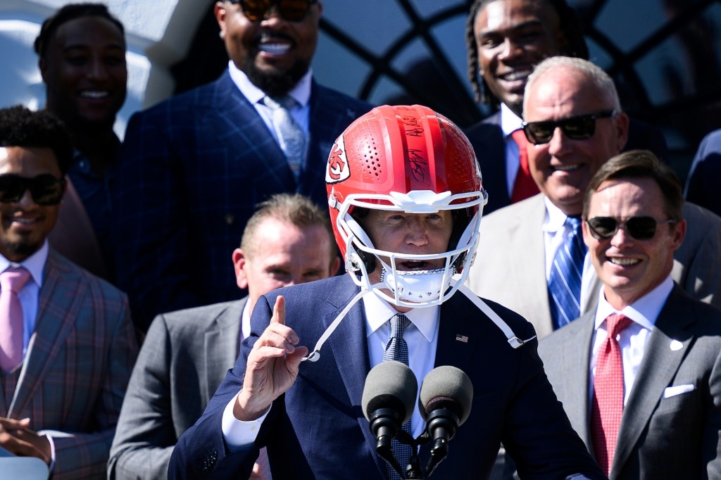 Helmet-wearing Biden aims to emulate back-to-back Super Bowl champs ...