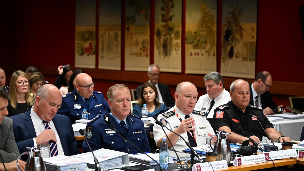 NSW Police Commissioner Mick Fuller (centre) at Senate Estimates into Police and Emergency Services Picture: Joel Carrett