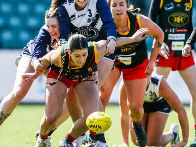 Alice Robinson of Bridgenorth shields the ball from an Old Launcestonians opponent.Picture: Linda Higginson