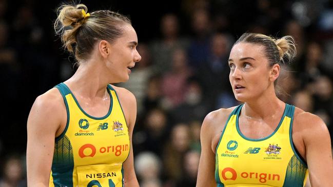 INVERCARGILL, NEW ZEALAND - OCTOBER 19: Kiera Austin and Liz Watson of Australia talk during game three of the Constellation Cup series between New Zealand Silver Ferns and Australia Diamonds at ILT Stadium Southland on October 19, 2023 in Invercargill, New Zealand. (Photo by Joe Allison/Getty Images)