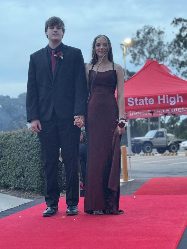 The students of Urangan State High School arriving at their formal.