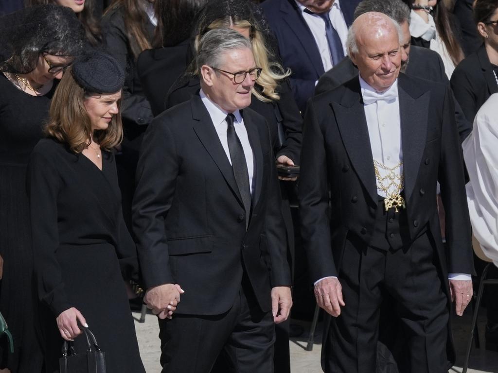 Mr. Starmer, center, and his wife Victoria. Picture: AP Photo/Gregorio Borgia