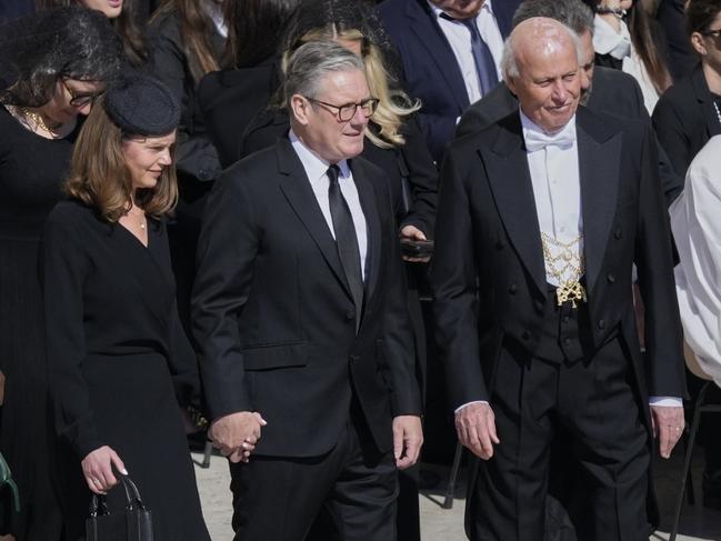 Mr. Starmer, center, and his wife Victoria. Picture: AP Photo/Gregorio Borgia