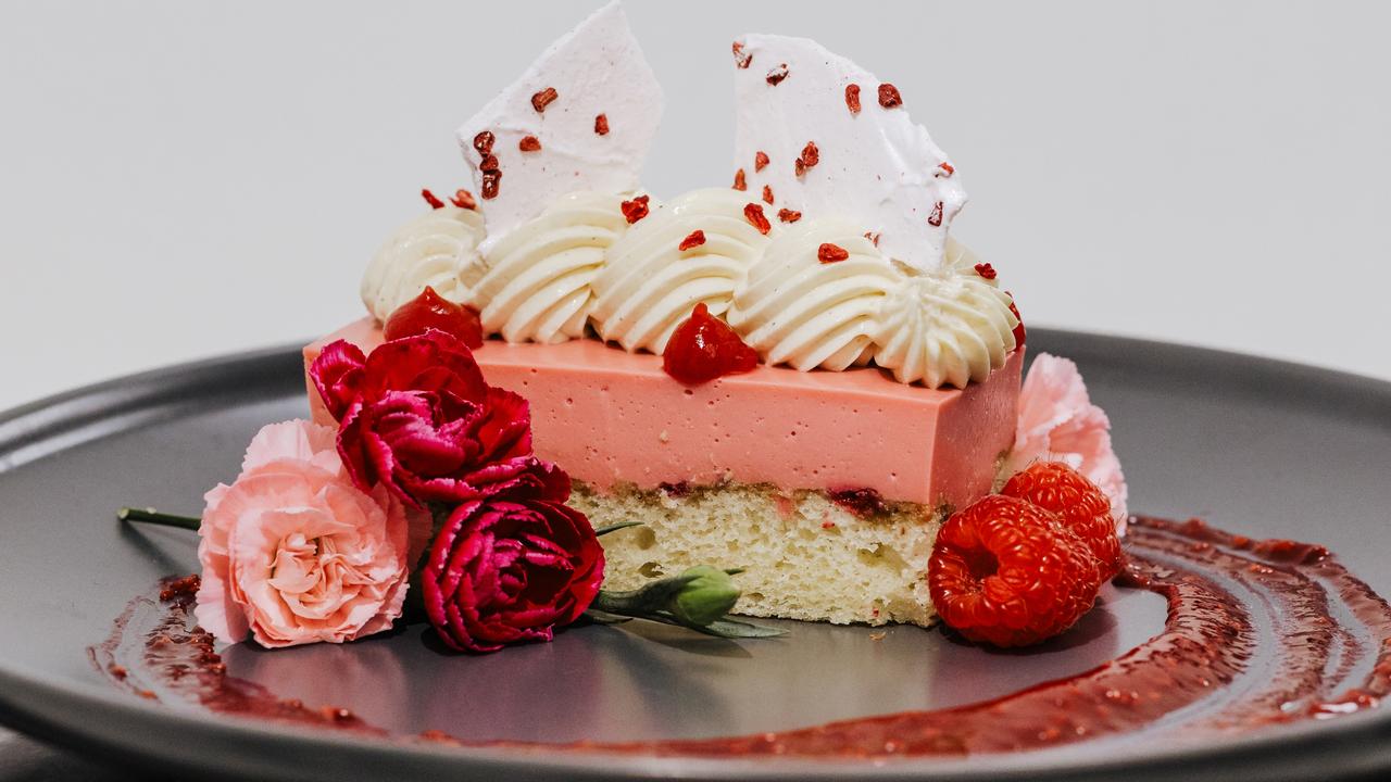 The Toowoomba Carnival of Flowers' #trEATS food trail for 2024. Highlands Cafe: Raspberry cake with coffee syrup, raspberry mousse, white chocolate cream, and coffee-infused meringue shards. Pair it perfectly with a 12oz Raspberry Candy specialty coffee, featuring notes of sweet raspberries and creamy white chocolate.