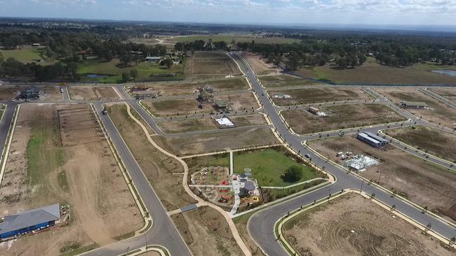 An aerial view of the The Gables circa 2018, before many of the houses were built. Many of the residents there are struggling with mortgage stress.