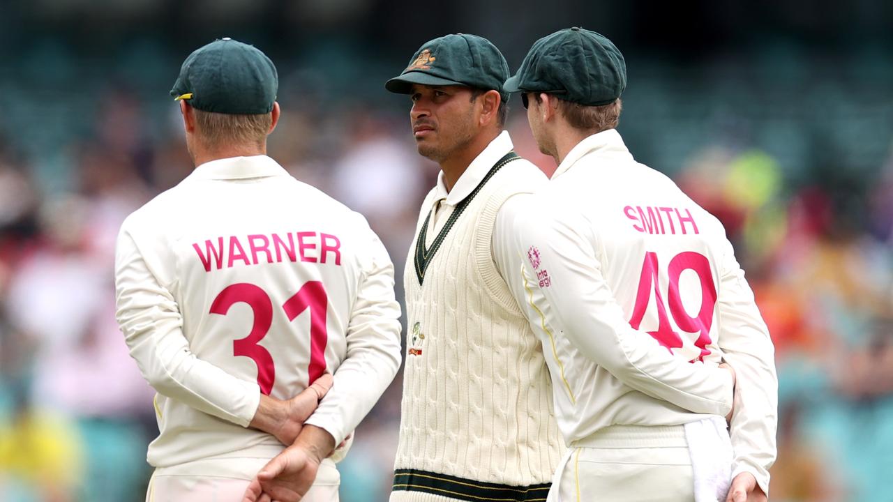 SYDNEY, AUSTRALIA - JANUARY 09: David Warner, Usman Khawaja and Steve Smith of Australia look on during day five of the Fourth Test Match in the Ashes series between Australia and England at Sydney Cricket Ground on January 09, 2022 in Sydney, Australia. (Photo by Cameron Spencer/Getty Images)