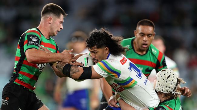 SYDNEY, AUSTRALIA - MAY 27: Corey Harawira-Naera of the Raiders is tackled during the round 13 NRL match between South Sydney Rabbitohs and Canberra Raiders at Accor Stadium on May 27, 2023 in Sydney, Australia. (Photo by Brendon Thorne/Getty Images)