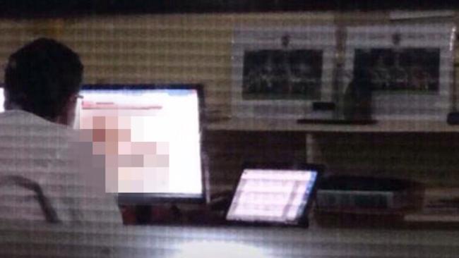 This photograph circulating on social media is believed to show Geelong College principal Andrew Barr watching pornography in his office.