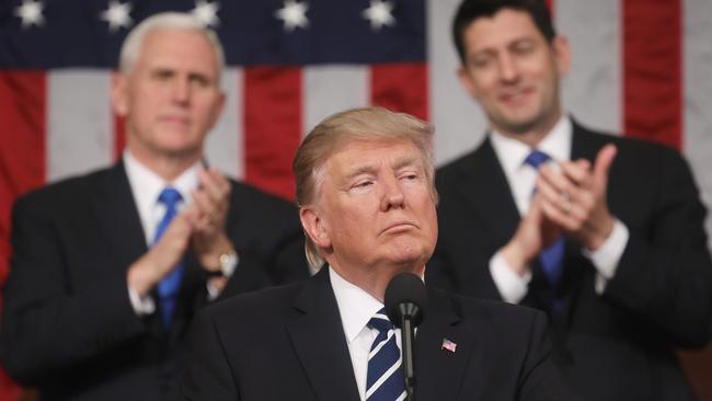 Donald Trump delivers his address to Congress, as Vice President Mike Pence and Speaker of the House Paul Ryan applaud. Pic: AFP