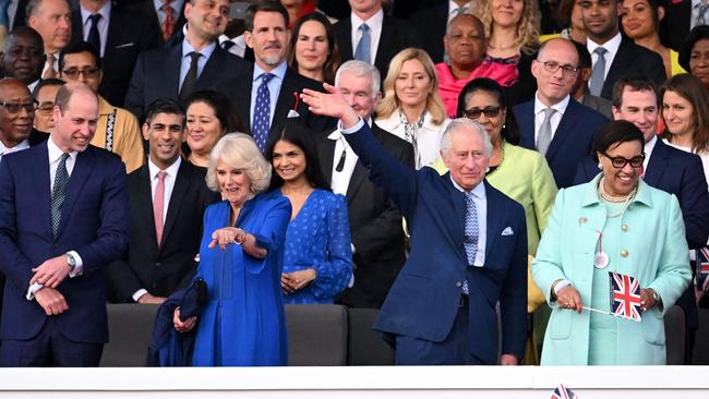 Britain's Queen Camilla (2L) and Britain's King Charles III (2R) react as they attend the Coronation Concert at Windsor Castle in Windsor, west of London on May 7, 2023. (Photo by Leon Neal / POOL / AFP)