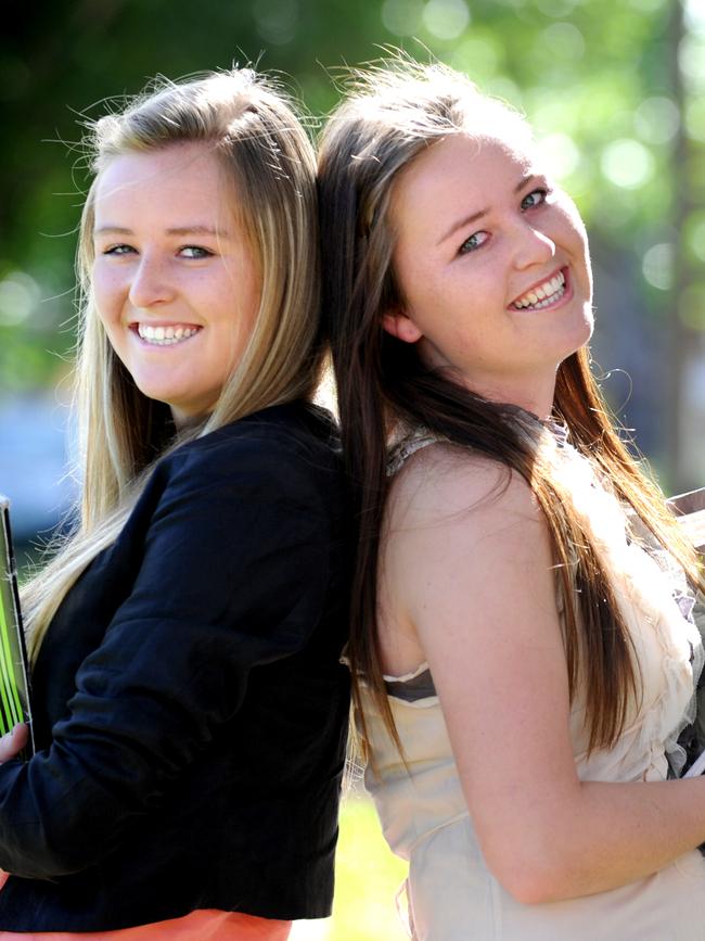 Ms Betro, right, and her twin sister Olivia, left, after both achieved an identical Australian Tertiary Admission Rank of 95.7 in Year 12. Picture: Naomi Jellicoe