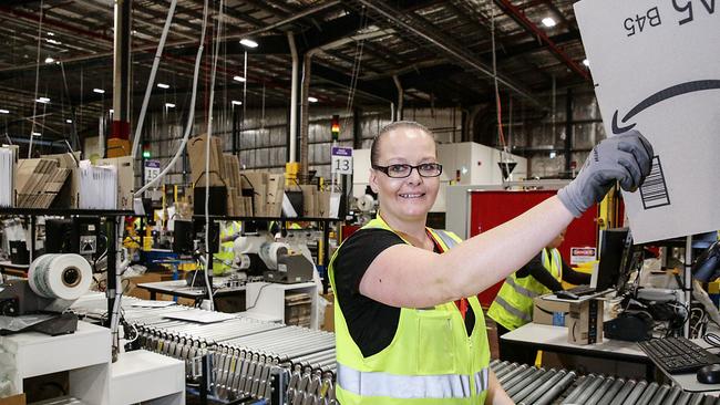 Dianne Nicholson packing customers orders. Picture: Carmela Roche