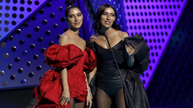 Lisa and Jess Origliasso of The Veronicas present the best female artist award. Picture: Getty Images