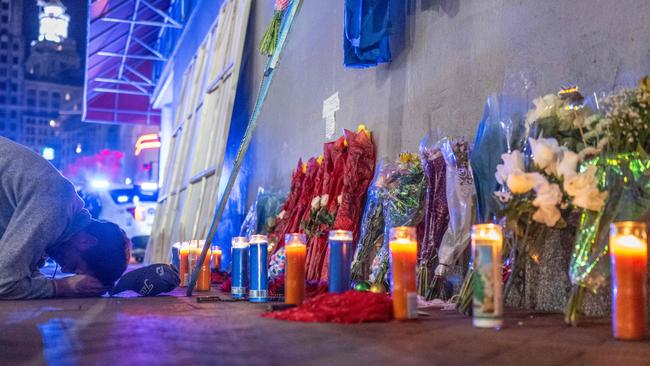 A memorial on Bourbon Street after it reopened to the public on January 2, 2025, in New Orleans, Louisiana. (Photo by ANDREW CABALLERO-REYNOLDS / AFP)