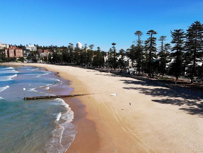 SYDNEY, AUSTRALIA - APRIL 05: A deserted Manly Beach following its closure today on April 05, 2020 in Sydney, Australia. Northern Beaches Council today closed Manly, North Steyne, Queenscliff, Freshwater and Palm Beach after crowds were seen gathering there defying social distancing regulations put in place by the government to combat the spread of COVID-19 in Australia. (Photo by Cameron Spencer/Getty Images)