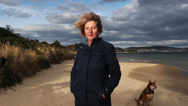 Sheenagh Neill of Hobart with her dog Rufus. Sheenagh was administered AstraZeneca for her first Covid vaccination and had a strong reaction. She has now gladly been approved to receive Pfizer for her second vaccination. Picture: Nikki Davis-Jones