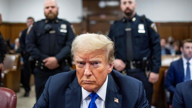 Donald Trump sits at the defendant's table during his hush money trial at Manhattan Criminal Court. Picture: AFP.