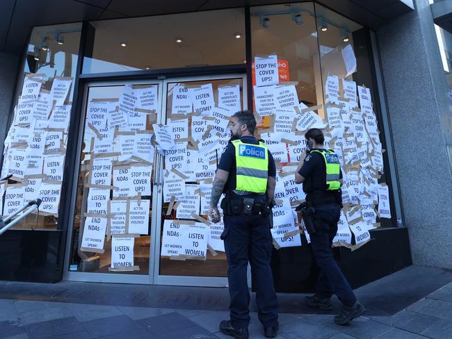 Police arrive at the Chapel St store. Picture: David Caird