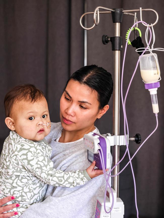 Mia Fulgencio with daughter Thea, who is on the waitlist for a liver transplant. Picture: Russell Millard