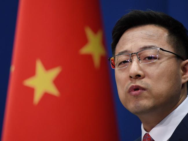 Chinese Foreign Ministry spokesman Zhao Lijian speaks at the daily media briefing in Beijing on April 8, 2020. (Photo by GREG BAKER / AFP)