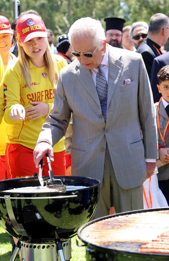 King Charles III takes over the cooking of the snags at the Premier’s Community Barbeque at Parramatta Park on October 22, 2024 in Sydney, Australia. Picture: Chris Jackson/Getty Images