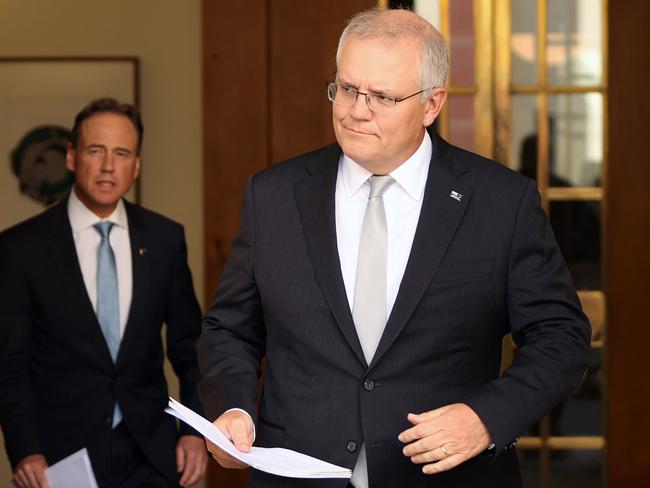 Prime Minister Scott Morrison with Greg Hunt during a press conference at Parliament House in Canberra. Picture: NCA NewsWire/Gary Ramage