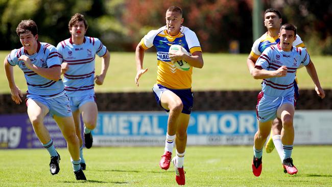 Jake Arthur makes a break in the NRL Schoolboy Cup. Picture: Toby Zerna