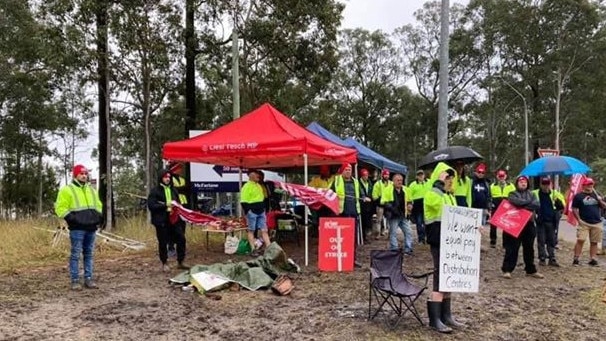 Woolworths Distribution Centre staff picketing outside the Warnervale facility as pay negotiations continue to break down. Picture: supplied