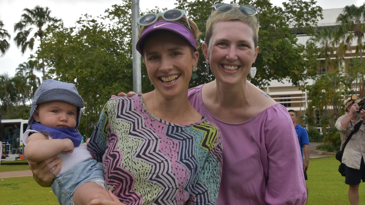 Five-month-old Magnolia Schrieke, Emily McGrath and Erin Lucas at the City of Darwin International Women's Day walk and Celebrations, Saturday March 5.