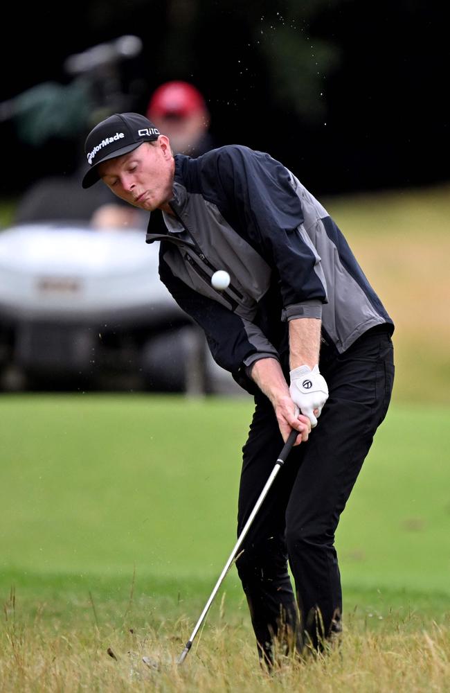 Ryggs Johnston hits out of the rough during the third round of the Australian Open. Picture: AFP